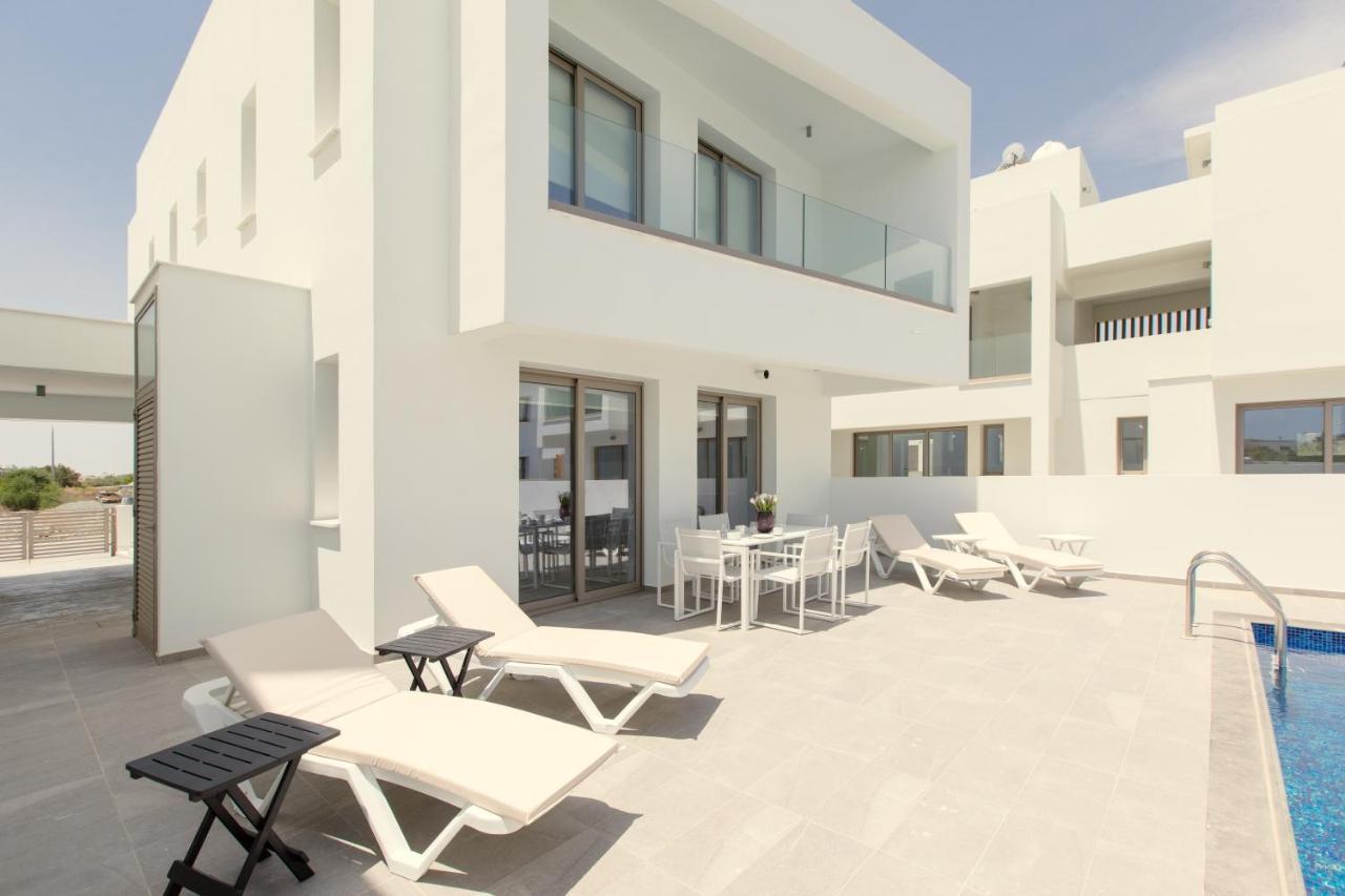Palm Tree Villas Livadhia Esterno foto